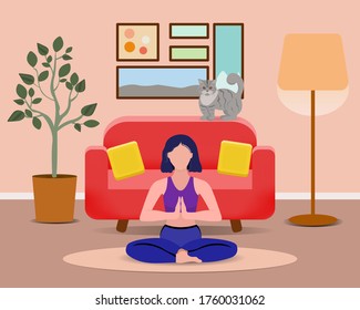 Woman doing yoga at home. The girl is meditating. Rest at home. The interior of the living room