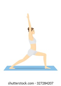 Woman doing yoga workout on blue mat in warrior posture.