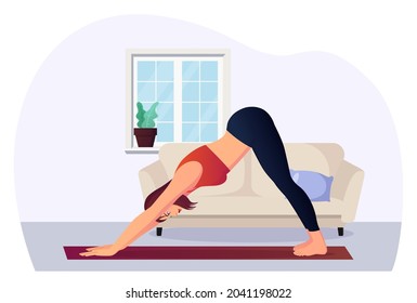 Woman in Downward Dog position practicing Yoga for wellness