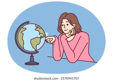 Woman dreams of traveling world looking at globe with planet earth and continents. Girl dreams of being tourist and going on trip to different countries and parts of world with distinctive culture