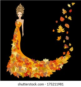 Woman dressed in autumn leaves