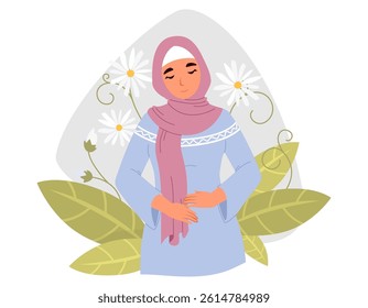 A woman dressed in a blue traditional dress and a pink scarf smiles gently while holding her hands on her stomach