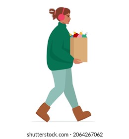 Woman dressed in warm clothing, carries paper package with Christmas toys. Christmas, winter seasonal card. Vector flat illustration, retro style