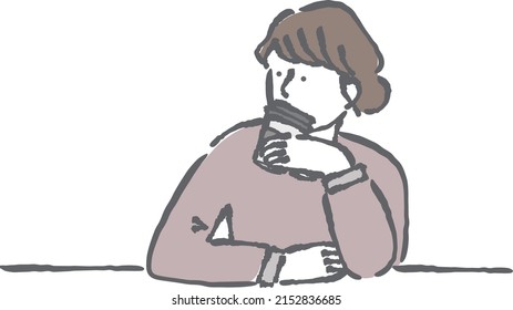 Woman is drinking coffee at the cafe