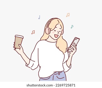 Woman drinking coffee while putting on an earphone to listen to music. Hand drawn style vector design illustrations.