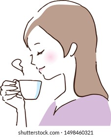 a woman drinking a cup of tea