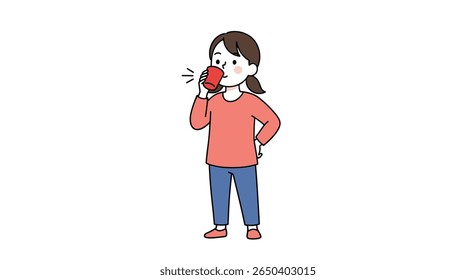 Woman is drinking a hot beverage from a red mug enjoying a warm moment of relaxation