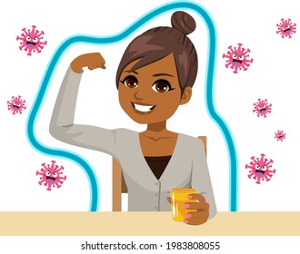 Woman drinking orange juice with protective barrier from virus and bacteria vitamin c immunization concept