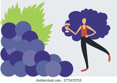 Woman drinking wine close to a bunch of grapes