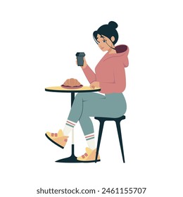 Woman drinks coffee or tea in cafe. Young female person with cup of coffee and croissant sitting at table in restaurant. Girl enjoy hot drink with pastry. Break for relaxation. Morning time.