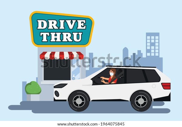 Woman drive a car into drive thru\
store new normal lifestyle prevention away from\
coronavirus.