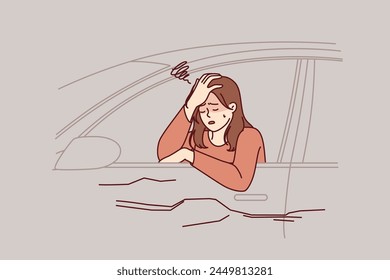 Woman driver was in car accident, crying sitting behind wheel in broken automobile and feeling dizzy due to hangover. Drunk girl caused car accident on highway because of lack knowledge traffic rules