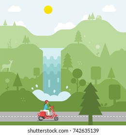 Woman driving scooter across the forest and waterfall in country road