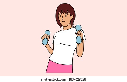 Woman with dumbbells in the hands