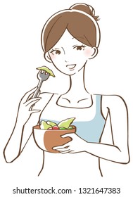 A woman eating a salad