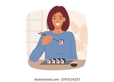 Woman eats maki rolls using chopsticks, sitting at table in oriental japanese restaurant. Girl smiles and rejoices at opportunity to taste maki rolls made from fresh rice and salmon with soy sauce