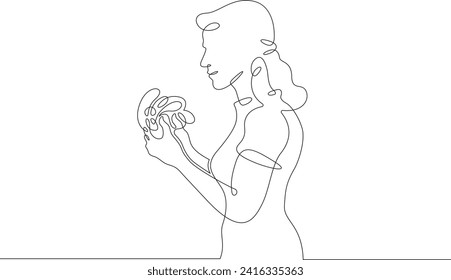 A woman eats street food. Fast food. A woman holds food in his hands.One continuous line drawing. Linear. Hand drawn, white background. One line