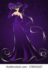 woman in the elegant long purple dress of silver decor