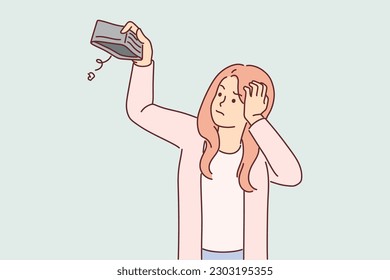 Woman with empty wallet has become poor due to unemployment or economic recession and crisis caused loss of money. Girl with embarrassment holds empty wallet after being victim of robber