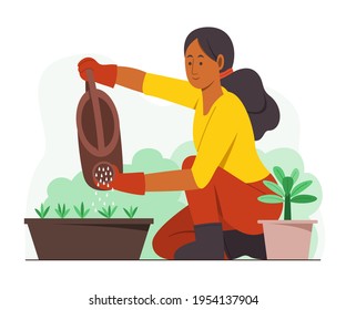 Woman Enjoy Watering the Plants in the Garden.