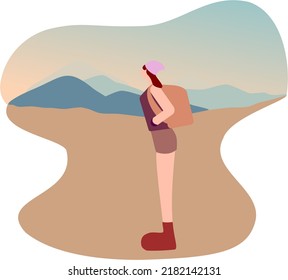 A woman enjoying nature with mountains in the backgroud and a bright sky