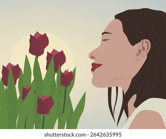 A mulher gosta do aroma das tulipas contra o pano de fundo do sol. A imagem transmite uma sensação de primavera, harmonia, paz e ternura feminina.