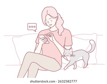 A woman enjoys her phone while a cat playfully interacts nearby, capturing warmth and companionship.