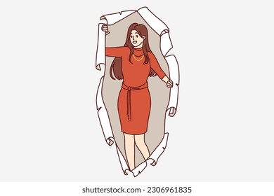 Woman in evening dress peeks out of hole in torn paper offering to attend party together. Young long-haired girl in elegant dress for carnival or corporate party smiles and looks at screen