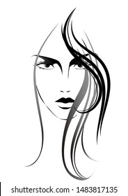 A woman face with long hair.
