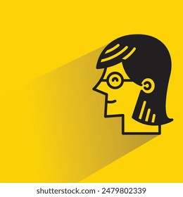 woman face sideview with drop shadow on yellow background