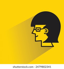 woman face sideview with drop shadow on yellow background