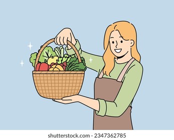 Una agricultora con cesta llena de verduras recomienda comer alimentos orgánicos naturales cultivados sin pesticidas. Una chica granjera en el delantal trabaja como vendedora en una tienda de verduras con productos útiles