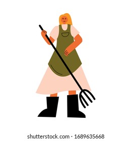 Woman farmer in boots standing and holding pitchfork vector illustration