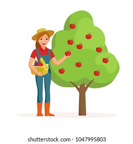 Woman farmer near apple tree holding ripe red apple and smiling with bucket of vegetables. Farming concept illustration in flat design. Happy gardener cartoon character isolated on white background.