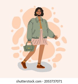 Woman in fashion spring or autumn clothes. Street style model. Colored hand drawn vector illustration isolated on abstract background.	