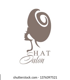 Woman in a fashionable turban. Fashionable Hat. Vector logo Hat Salon.
