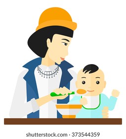 Woman feeding baby.