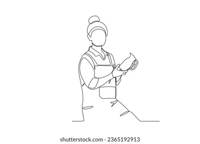 A woman finishes her work. Dia de la mujer emprendedora one-line drawing