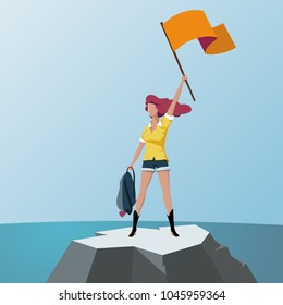 Woman with flag on top of a mountain
