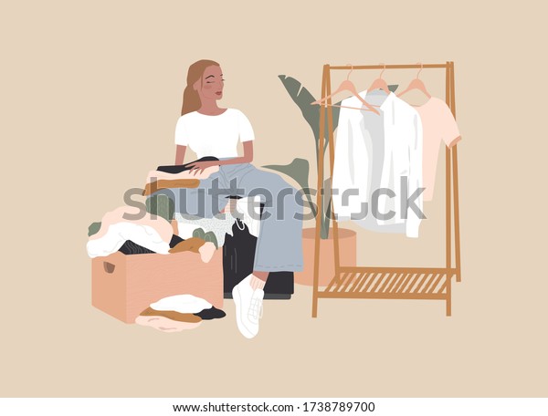 A\
woman is folding clothes. Second Hand donation box bin. Art in\
Scandinavian style. Colored vector illustration in flat cartoon\
style. Big clothing rack. Young girl sorting\
things