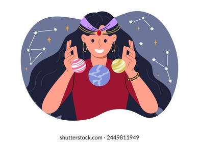 Woman fortune teller is interested in astrology, predicting future by studying constellations in sky and positions planets. Girl studies astrology and numerology, compiling horoscopes or natal chart.