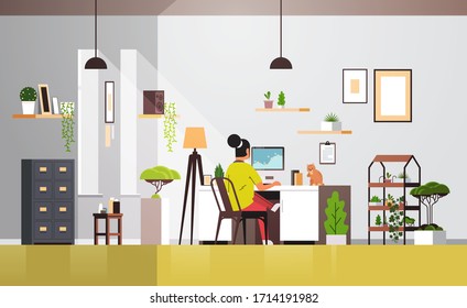 woman freelancer using computer monitor working at home during coronavirus quarantine self-isolation social distancing concept living room interior horizontal full length vector illustration