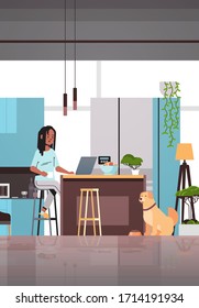 woman freelancer using laptop working at home during coronavirus quarantine self-isolation freelance social distancing concept modern kitchen interior vertical full length vector illustration