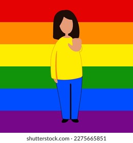 A woman in front of a rainbow LGBT flag in casual clothes with a blank poster in her hand. She extended her hand, gesture stop. The concept of protest, demonstration, fight for rights.