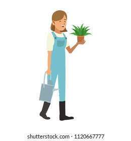 Woman gardener with plant and water can