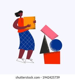 woman with geometric shapes in her hands.Metaphor of creative project creation.The concept of workflow organization and brainstorming.Creative aсtivities and ideas.Engineering works.Startup.