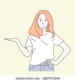 Woman gesturing hand pointing or showing to something for present, adverting concept.