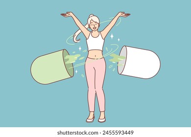 Woman with giant capsule of vitamins to detoxify body and strengthen immune system. Slender girl recommends new vitamins to reduce appetite and get rid of excess weight in short time