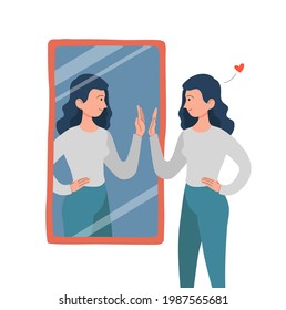 A woman or girl looks at herself in the mirror. Self love and happiness concept. The woman gives the reflection a high five.