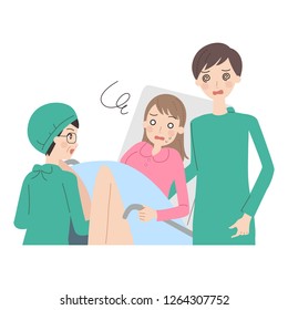 A woman giving birth.